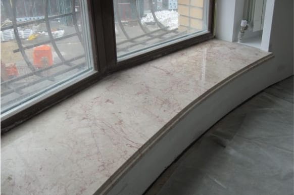 Монтаж підвіконь зі штучного каменю: